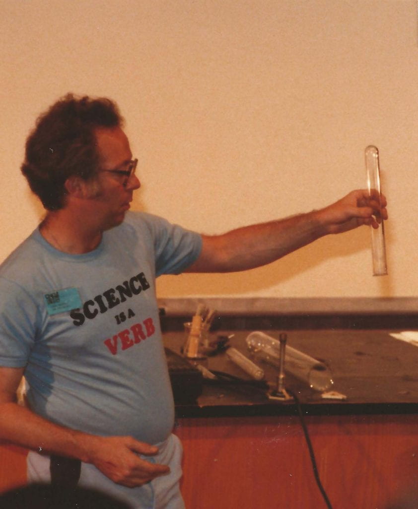 Irwin Talesnick holding a test tube