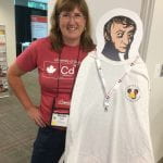 Bonnie Lasby with Avo, the cardboard cutout of Avogadro.