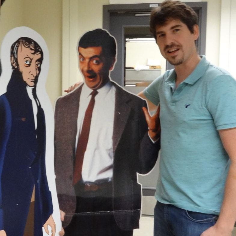 Jay Leitch with cardboard cutouts of Avogadro and Mr. Bean.